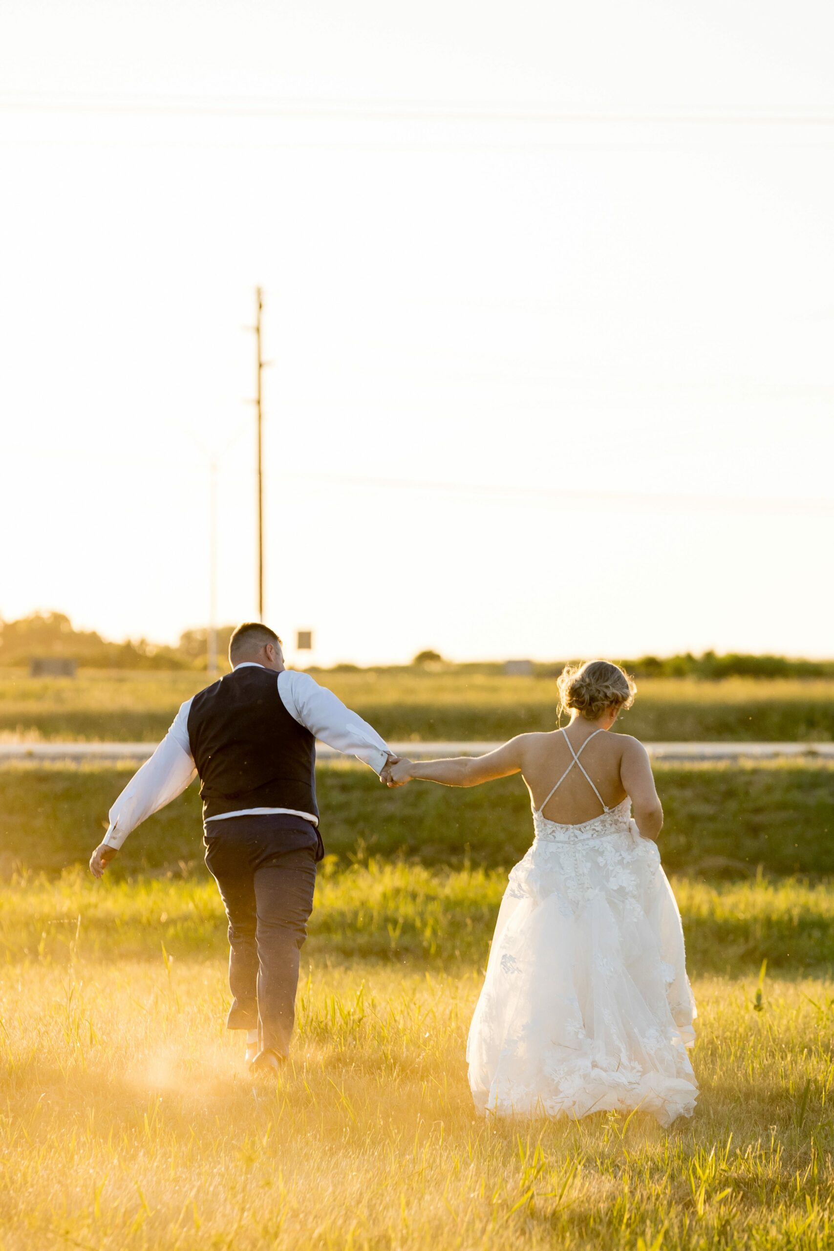sunset wedding photos in field