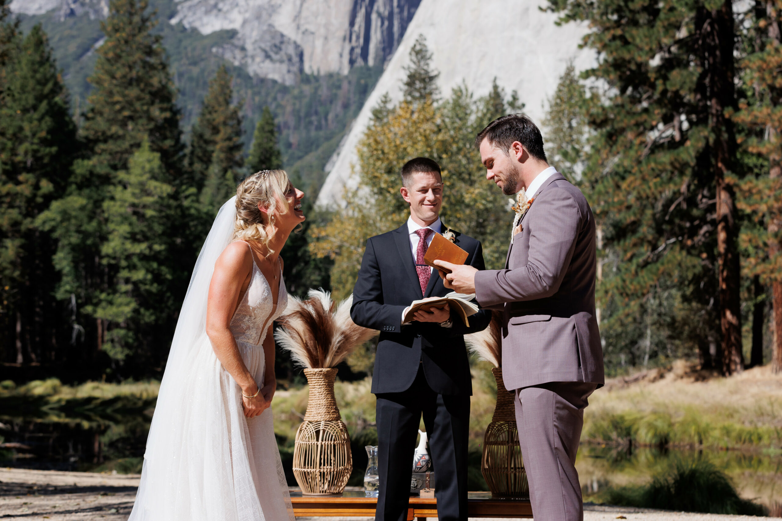 bride and groom exchanging vows at yosemite
